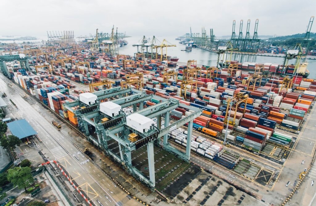 Shipping containers at a port, where freight and landed cost affect margin
